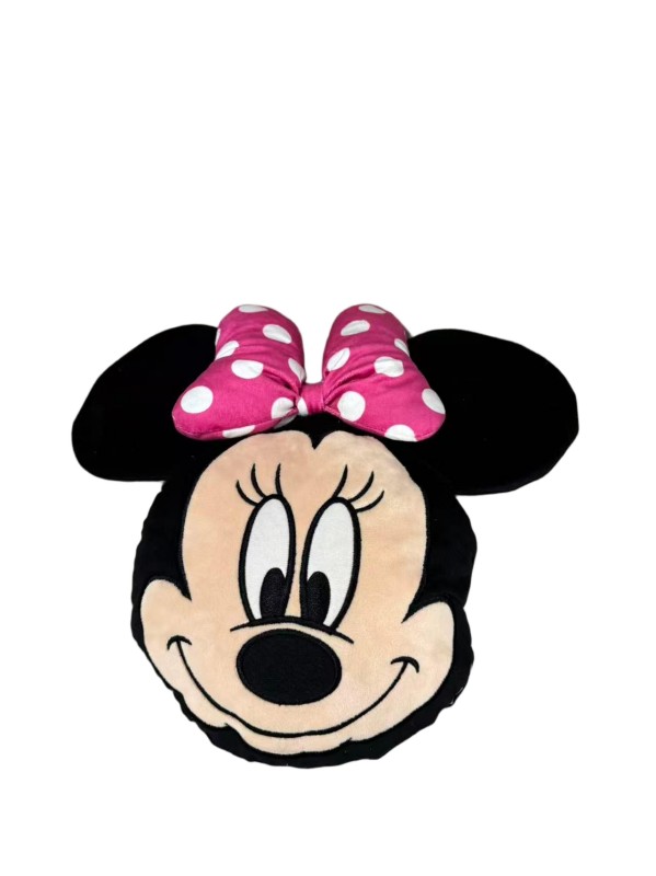 Minnie Mouse face cushion — magenta bow — A flat face silhouette with a white-spotted magenta bow.