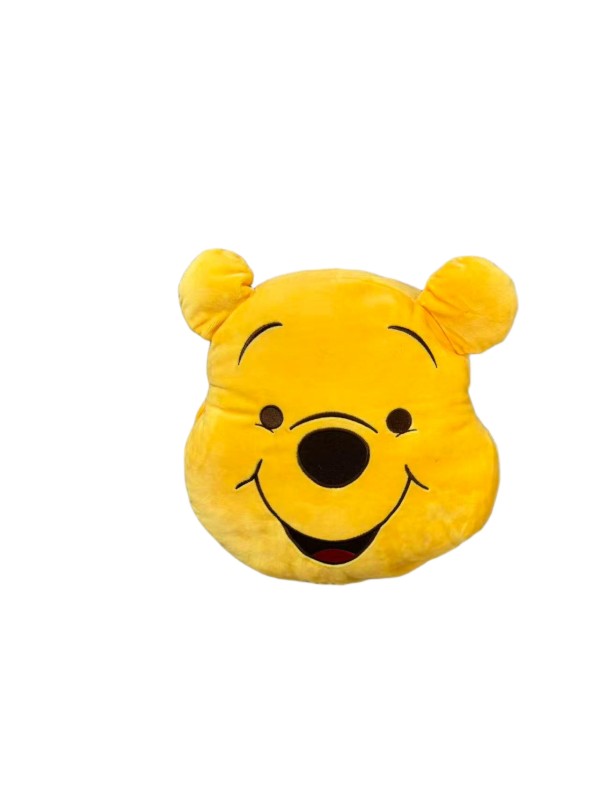 Winnie the Pooh face cushion — Yellow bear silhouette with a smiling embroidered face.