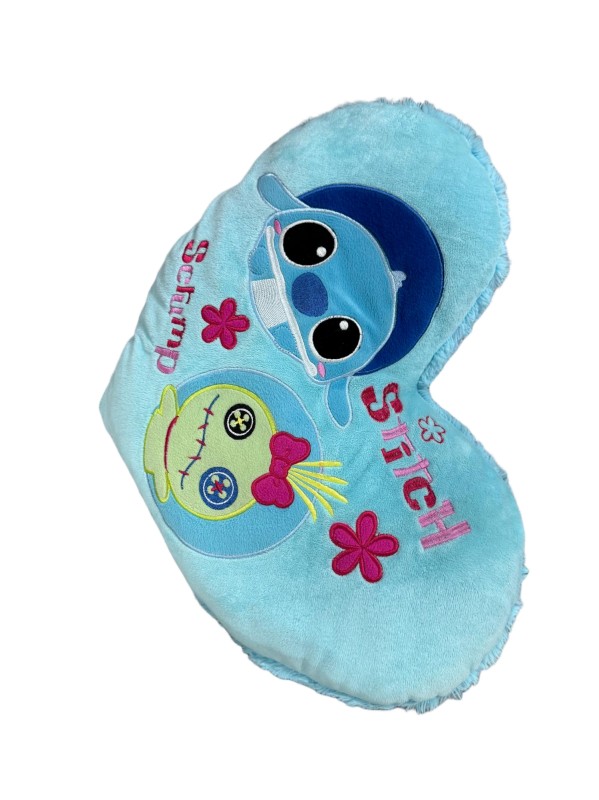 Stitch and Scrump heart cushion — Light blue heart shape with two character motifs and floral details.