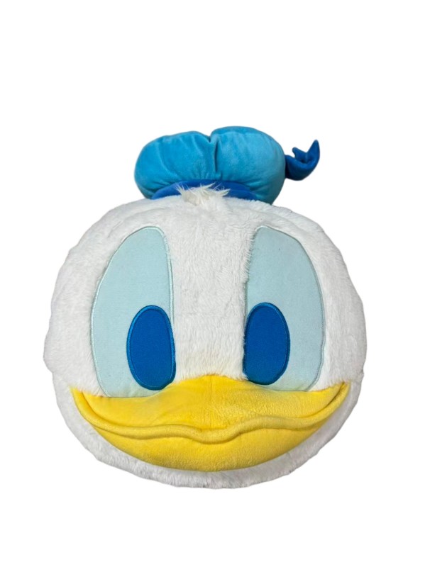 Donald Duck face cushion — White face, blue cap and eye details, and a dimensional yellow bill.